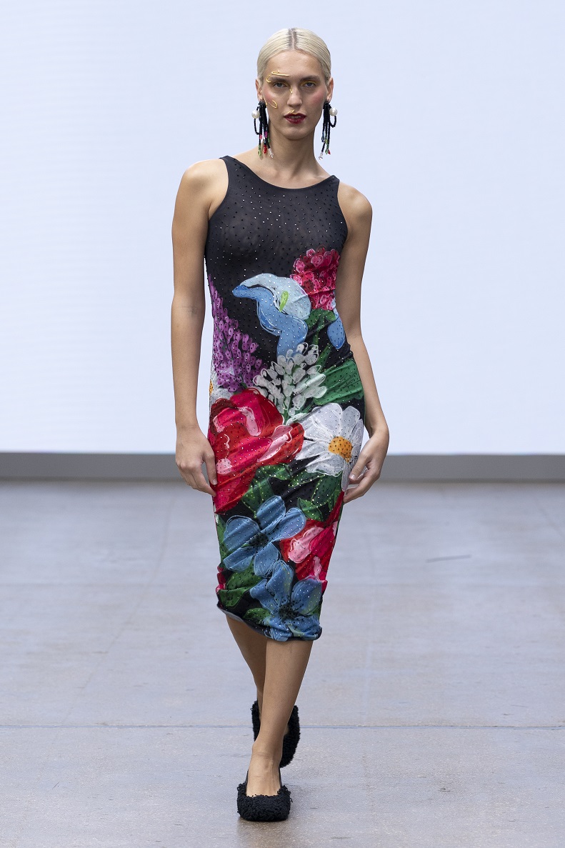 A model walks in the FAM IRVOLL catwalk walking the Fam Irvoll catwalk for SS26 at LFW.