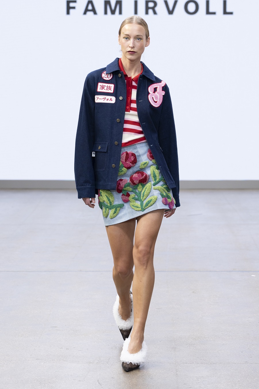 A model walks in the FAM IRVOLL catwalk walking the Fam Irvoll catwalk for SS26 at LFW.