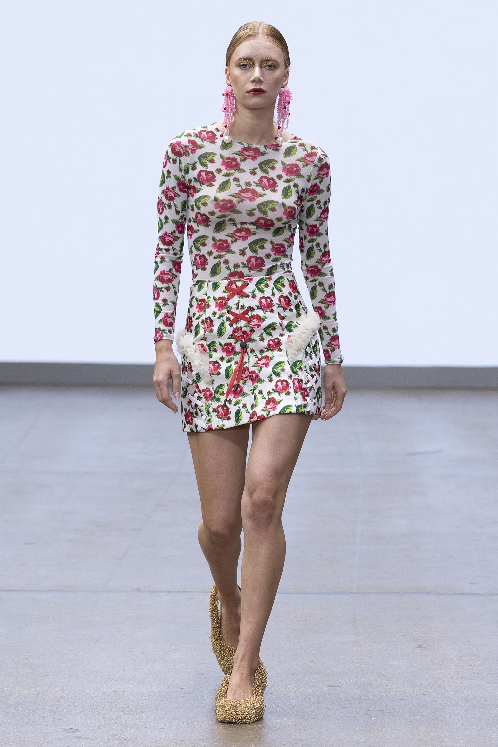 A model walks in the FAM IRVOLL catwalk walking the Fam Irvoll catwalk for SS26 at LFW.