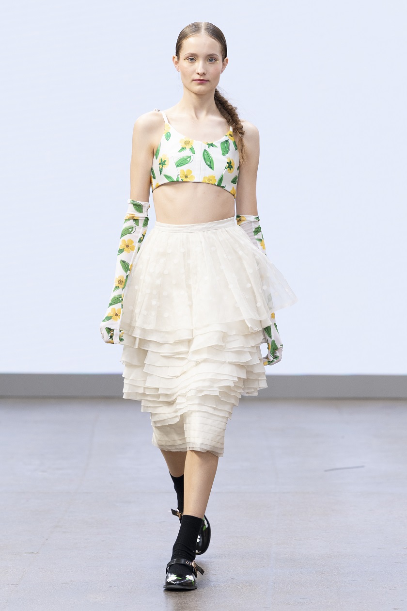 A model walks in the FAM IRVOLL catwalk walking the Fam Irvoll catwalk for SS26 at LFW.